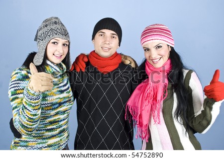 Three people friends standing in a line and giving thumbs up ,concept of successful friendship