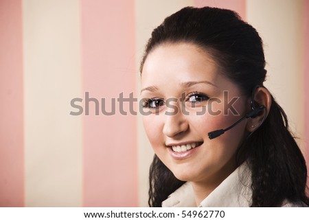 Head shot of young woman customer service smiling and looking at camera ,copy space for text message in left part of image,vertical blinds background
