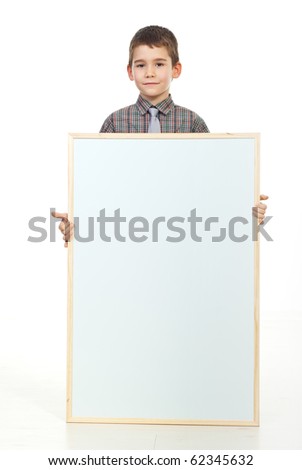 Preschooler boy with soft smile holding a blank paper placard