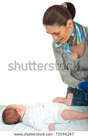 Mother prepare to change nappy to her newborn baby  against white background