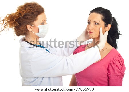 White Plastic Surgery on Doctor With Protective Mask Preparing Woman For Plastic Surgery