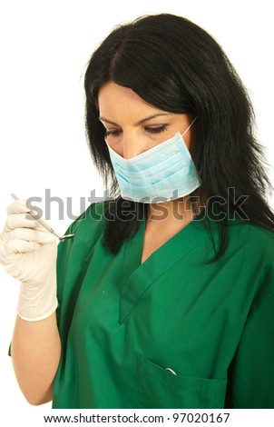 Close up of dentist woman holding mirror dental tool isolated on white background