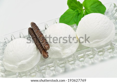 Vanilla ice cream with chocolate biscuits, close up / Vanilla ice cream