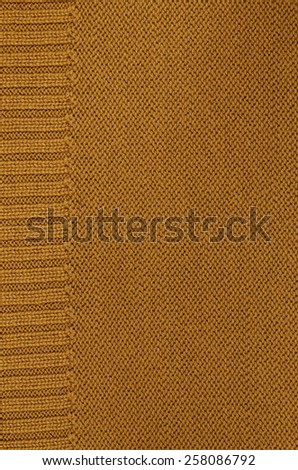 close up of a rust colored knitted background pattern, knitted right and left, detail, vertical / Rust colored knitted Background Pattern