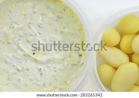 close up of two bowls with  curd cheese and boiled potatoes, detail, macro, full frame, horizontal / Curd Cheese with Chive and boiled Potatoes