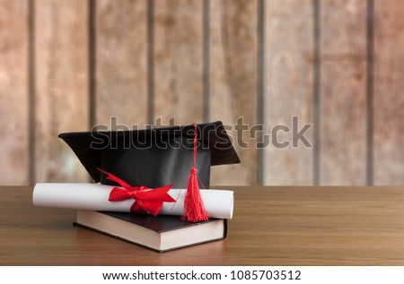 Graduation black hat on desk