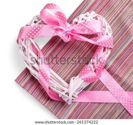 Happy International Women\'s Day, March 8, celebration greeting message with pink rattan cane heart and stripe ribbon.