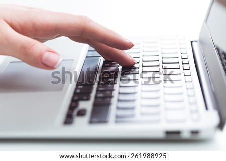Computer Mouse. Human hand holding laptop mouse
