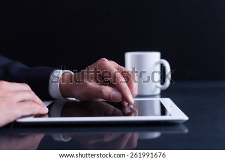 Lawyer. Businessman writing a letter, notes or correspondence or signing a document or agreement, close up view of his hand and the paper