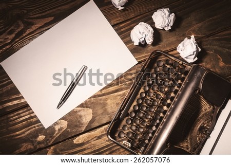 Writer. Vintage typewriter and a blank sheet of paper, retouching retro