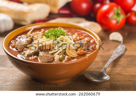 Soup. bowl of bean soup with rosemary