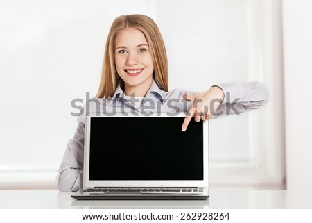 Laptop. picture of smiling businesswoman with laptop computer