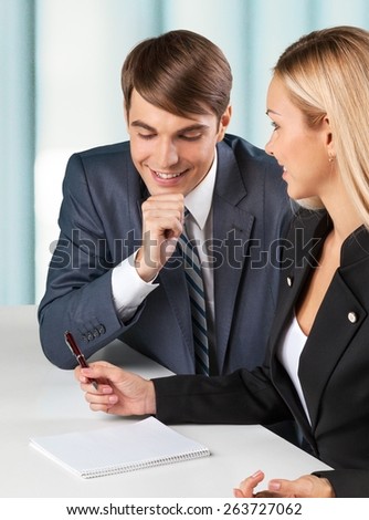 Asking. Businesswoman consulting a partner