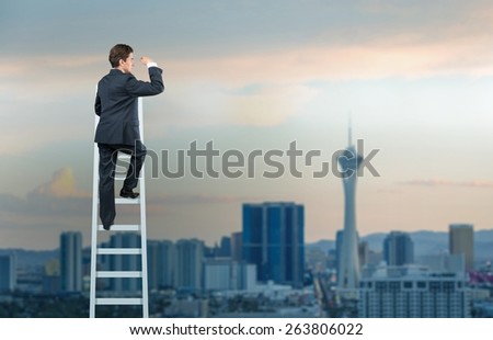 Ladder. Man climbing on ladder, urban business concept