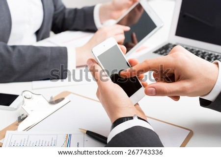 Business, phone, laptop.