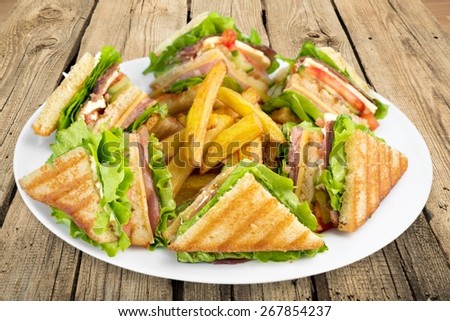 Club Sandwich, Sandwich, French Fries.