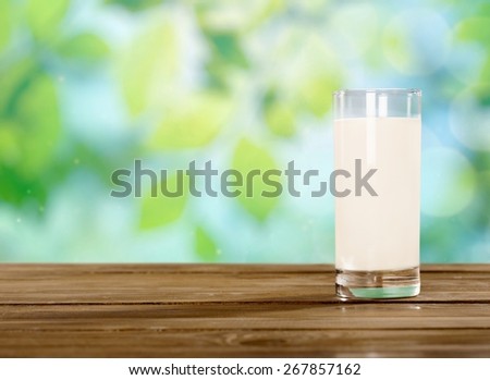 Milk. Glass of milk and sunny day