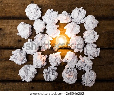 New. New idea concept with crumpled office paper and light bulb