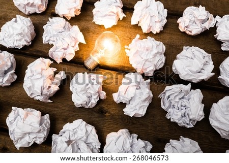 New. New idea concept with crumpled office paper and light bulb