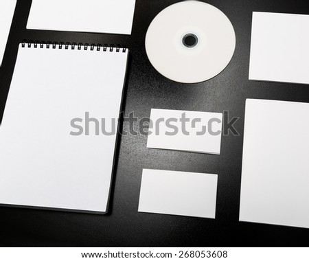 Blank. Blank stationery set on black wood background / business cards, letterheads, disk, envelope, booklet, notepad