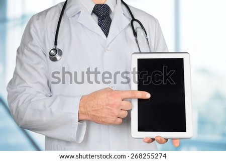 Man. Close up of male doctor holding smartphone with medical app