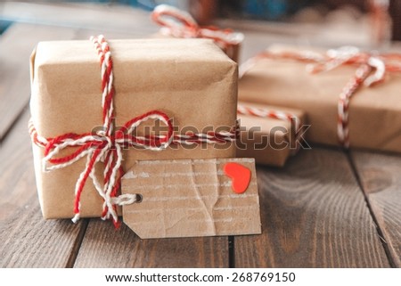 Craft. Handmade present boxes with tags and twine cord ribbons