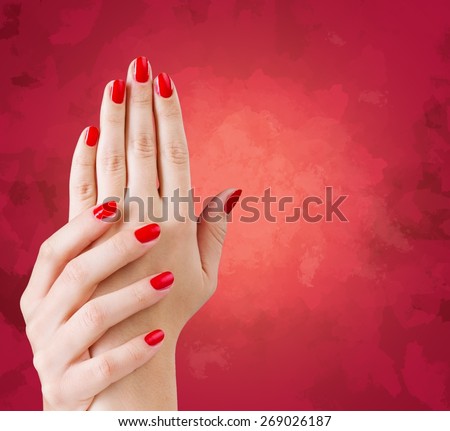 Nail. Hand with nail red manicure isolated on white background