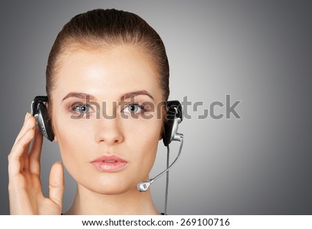 Assistant. Futuristic female helpline operator with headphones and virtual screen