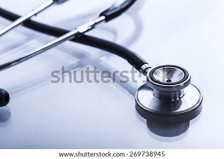 Stethoscope frame. Stethoscope on blue background