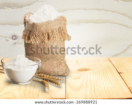 Agriculture. Whole flour in bag with wheat ears