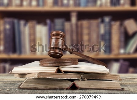 Law. Gavel on open books