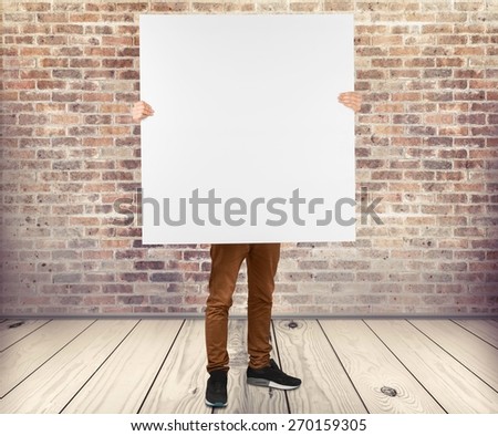 Poster. Girl holding blank poster