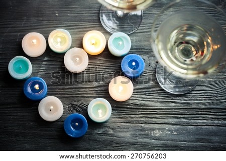 Wine. St Valentine\'s day candles with champagne