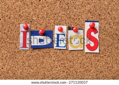 Vision. The word Ideas in cut out magazine letters pinned to a cork notice board. Ideas are the basis of creativity and success in business and life.