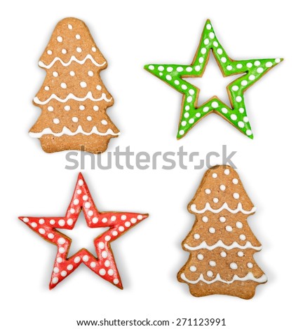 Food. Christmas Ginger and Honey cookies on isolated white background. Star, fir tree, snowflake shape.