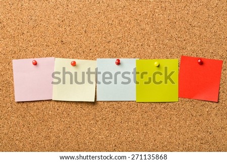Sticker. The word learn with stickers note pinned on a cork bulletin board