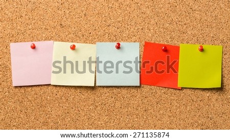 Sticker. The word learn with stickers note pinned on a cork bulletin board