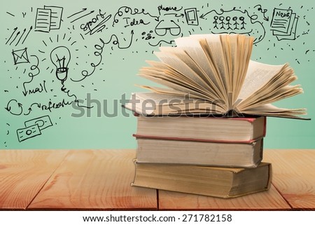 Chemistry. A hand holding books with words and letters representing education and knowledge concept
