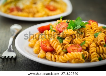 Pasta. Pasta fusilli with bolognese tomato beef sauce on the kitchen table