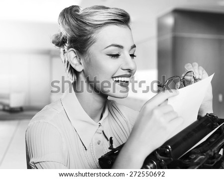 Work. Profile of a young woman typing musical notes with a typewriter