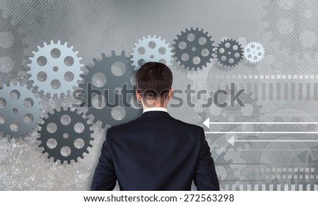 Gear. Businessman working with gear to success as concept