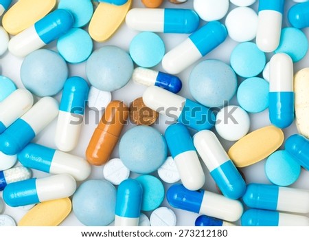 Medication. Heap of medicine pills.  Background made from colorful pills and capsules