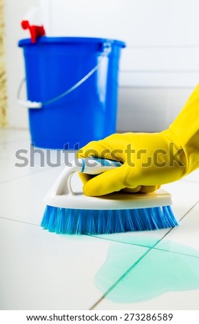 Cleaning. Cleaning House - Scrubbing the Floor