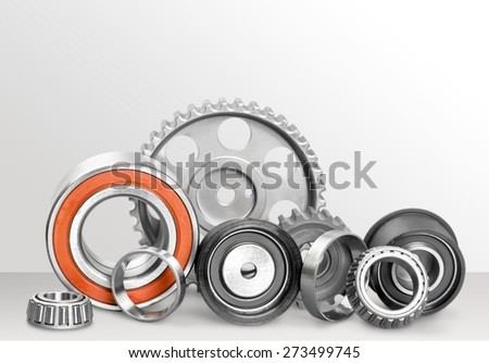 Bearing. Composition of steel ball roller bearings in closeup isolated on white background