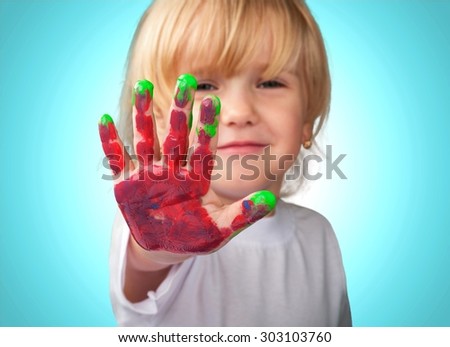 Kid with painted hands, indian, paintings.