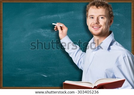 Teacher, student, chalkboard.