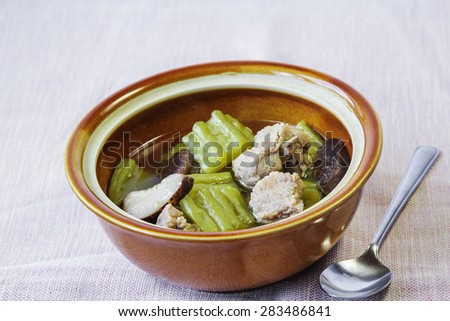 Bitter Melon with pork rib and mushroom in clear soup