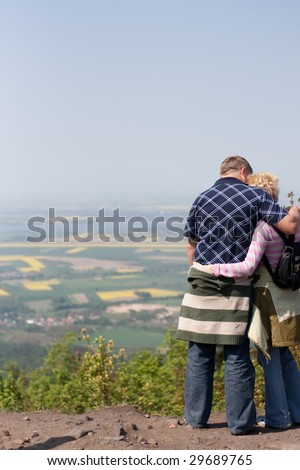 tourists, couple admiring beautiful landscape, love, mountain