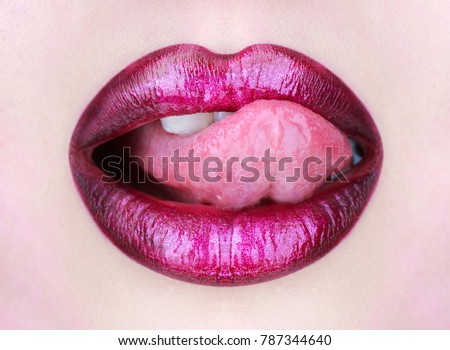 Beautiful lip, lipstick and lipgloss, passionate. Tongue and sexy mouth. Woman lip, female lips. Sexy lips, tongue out. Beautiful sexy woman, nude girl. Close up, macro with beautiful mouth.