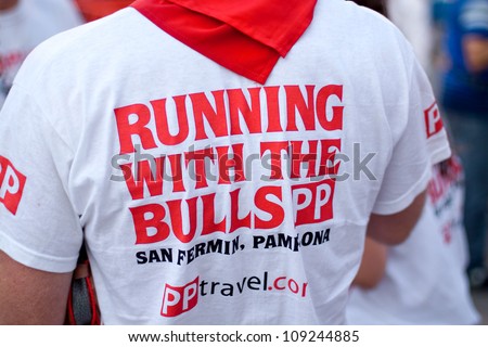 PAMPLONA, SPAIN -JULY 8: The man in the original T-shirt at the festival of San Fermin in Pamplona, Spain on July 8, 2012.